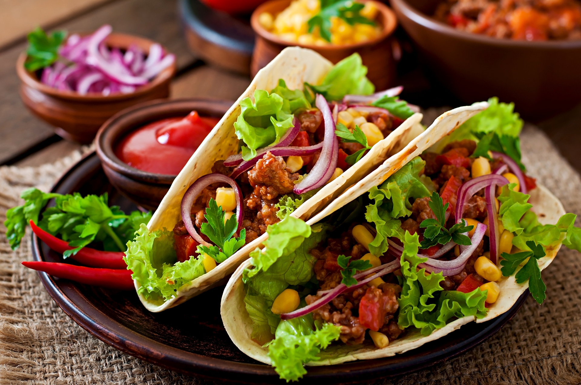 Vibrant Mexican cuisine with tacos, burritos, enchiladas, guacamole, and freshly made tortillas